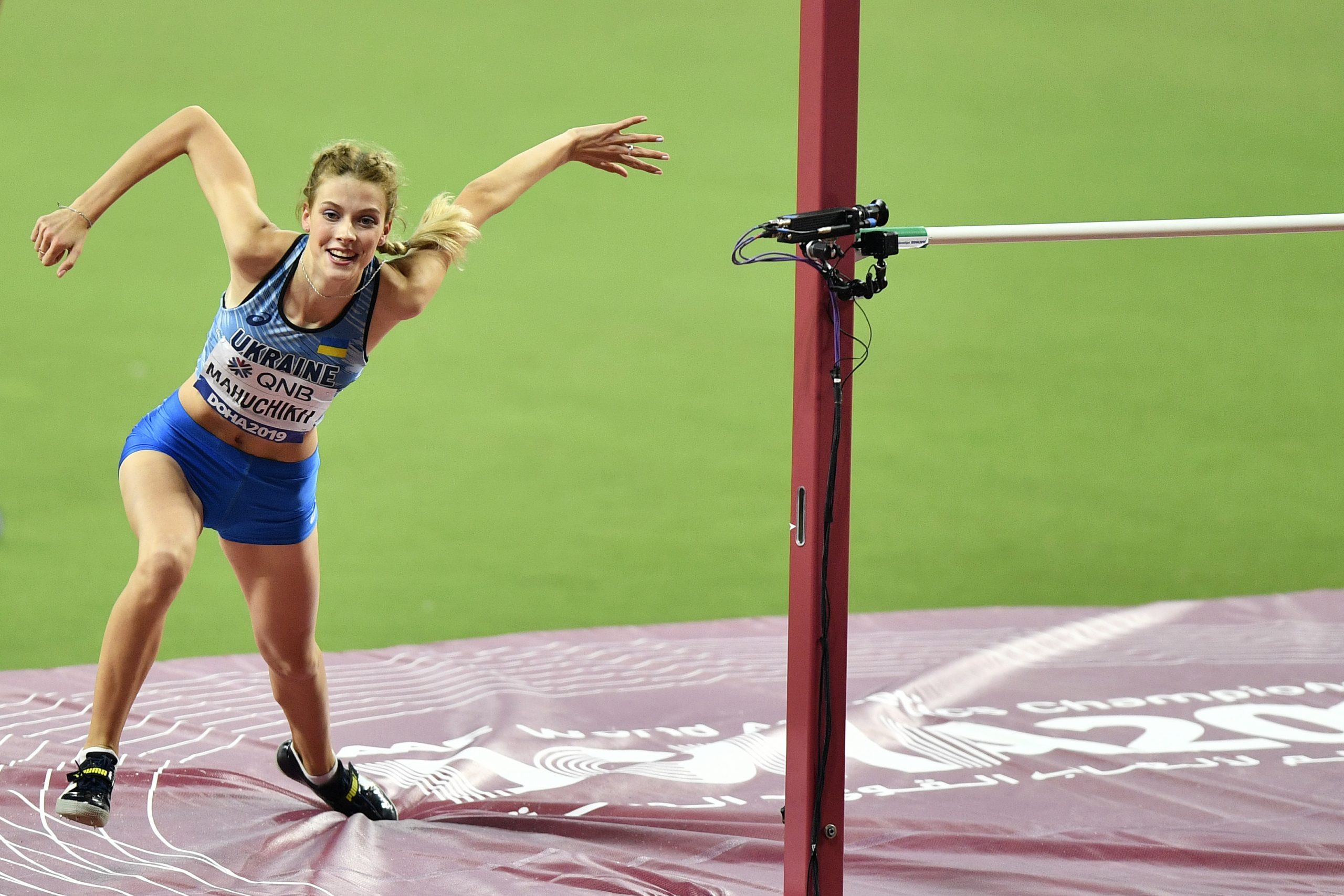 Yaroslava Mahuchikh, of Ukraine, reacts after an attempt in the women's high jump final during the World Athletics Championships in Doha, Qatar, Monday, Sept. 30, 2019. (AP Photo/Martin Meissner)